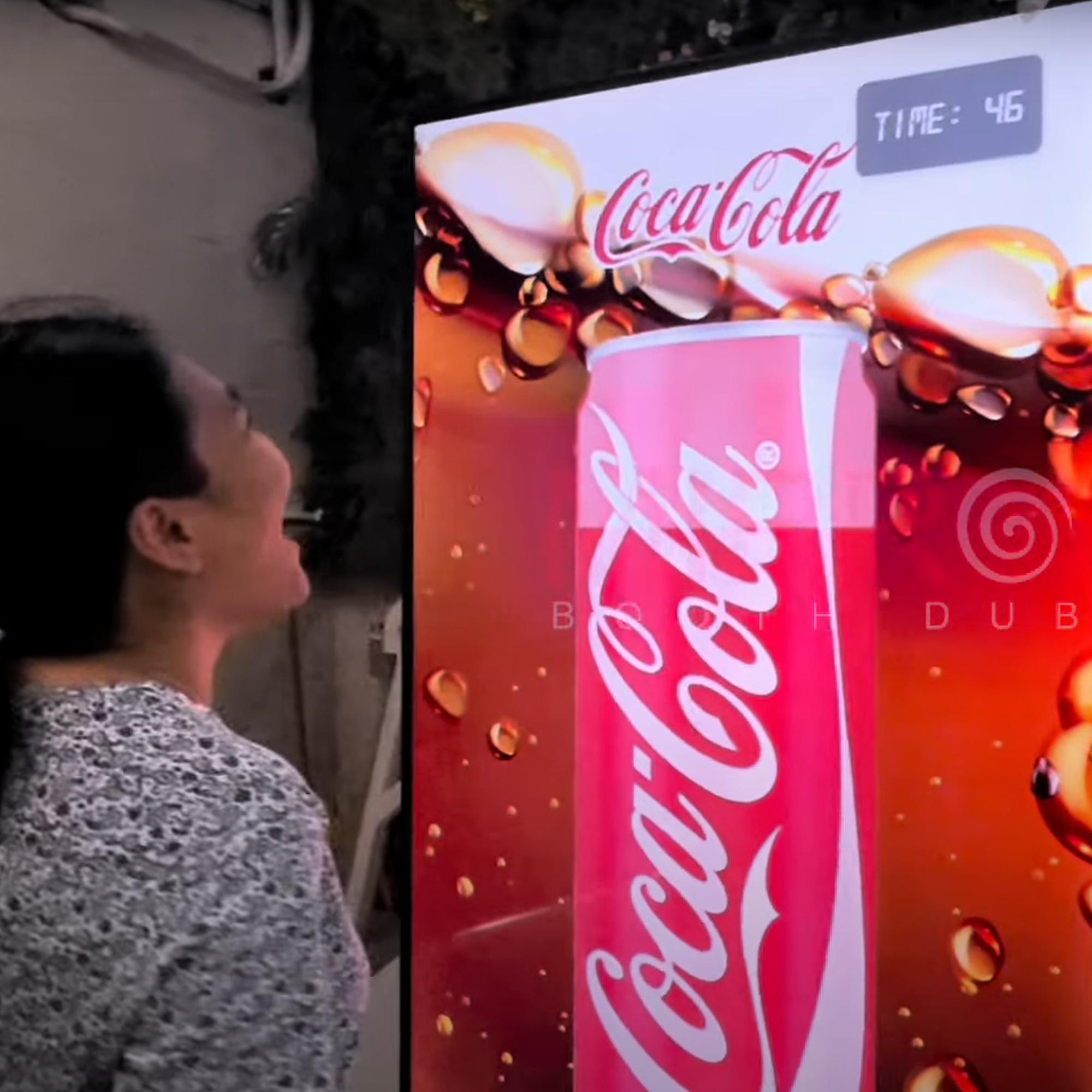 people playing the Interactive Scream Game at an event in Dubai, cheering and shouting to control to win the game