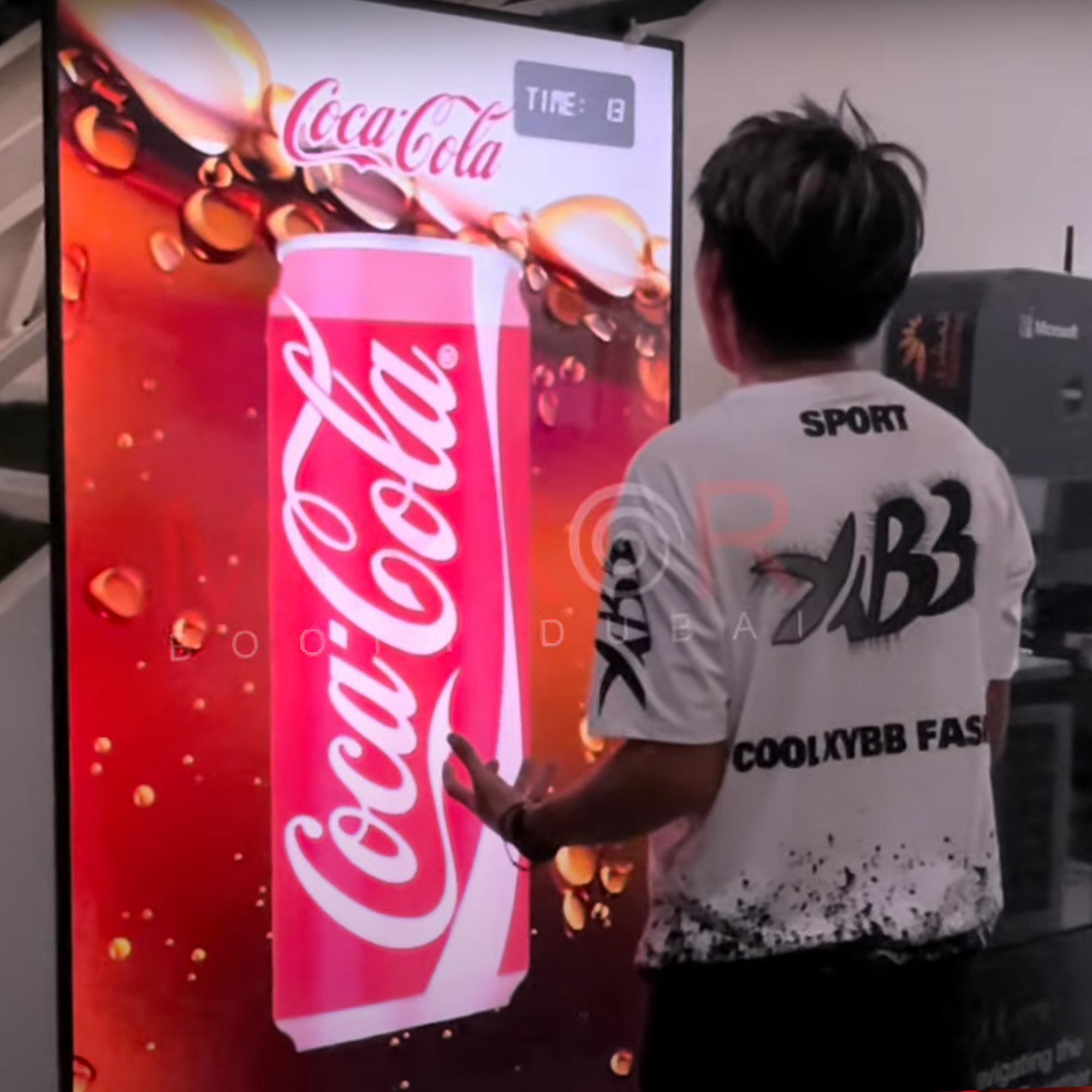 people playing the Interactive Scream Game at an event in Dubai, cheering and shouting to control to win the game