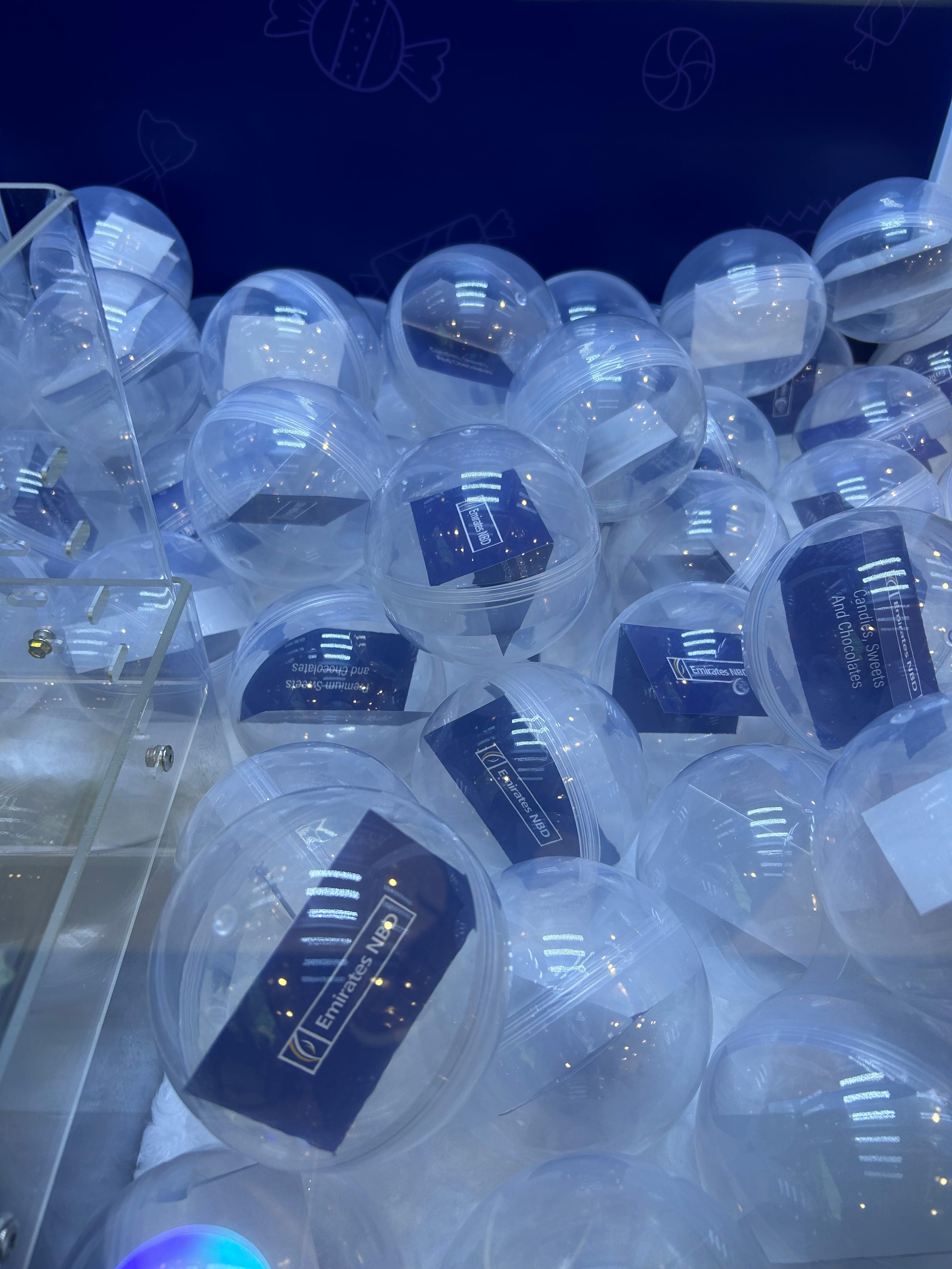 EXPLORE CLAW MACHINE FROM MIRROR BOOTH EVENT SERVICES L.L.C, PROVIDING TOP EVENT SERVICES IN DUBAI.